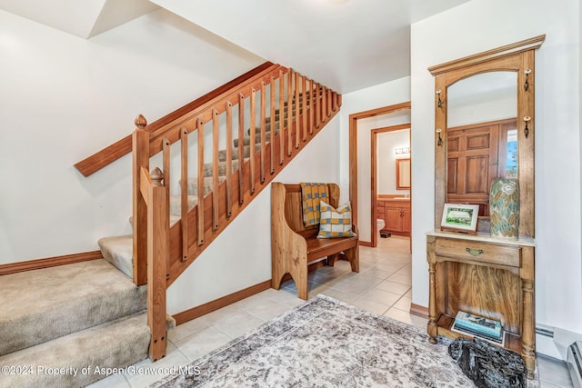 interior space featuring tile patterned floors and a baseboard radiator