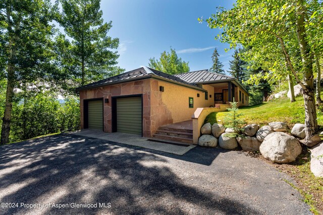 exterior space featuring a garage