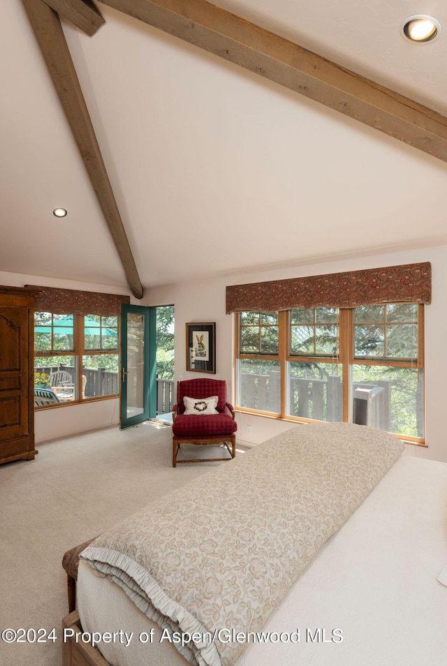 bedroom with carpet floors and lofted ceiling with beams