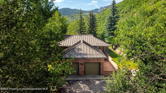 exterior space featuring a mountain view