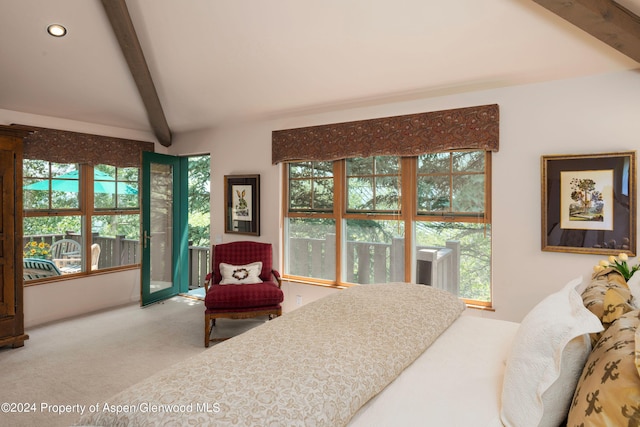 carpeted bedroom with lofted ceiling with beams