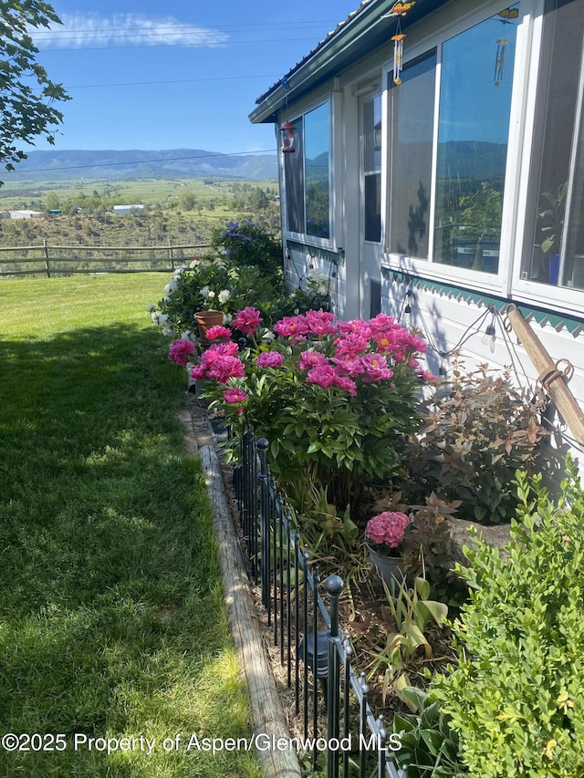 view of yard featuring fence