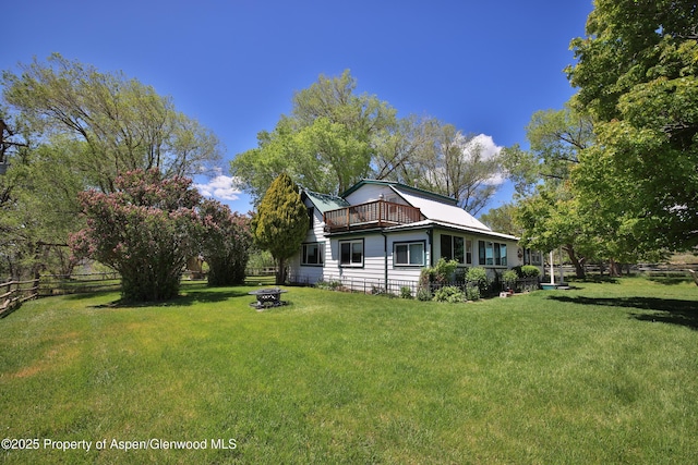 58590 Pe 3/10 Rd, Collbran, CO 81624 - view of side of home featuring an outdoor fire pit and metal roof