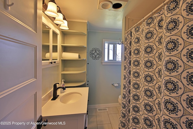 58590 Pe 3/10 Rd, Collbran, CO 81624 - full bath featuring vanity, tile patterned floors, toilet, crown molding, and curtained shower