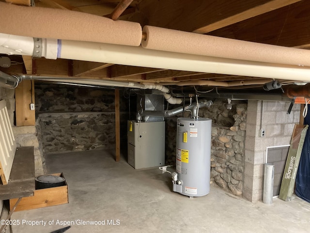 58590 Pe 3/10 Rd, Collbran, CO 81624 - unfinished basement featuring water heater