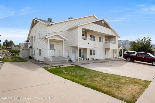 18 Angelica Cir, Parachute, CO 81635 - multi unit property with concrete driveway and a balcony