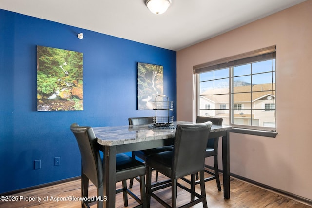 18 Angelica Cir, Parachute, CO 81635 - dining room with wood finished floors and baseboards