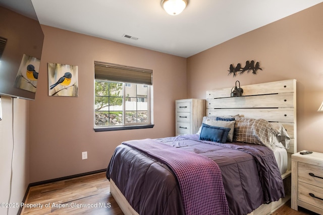 18 Angelica Cir, Parachute, CO 81635 - bedroom with wood finished floors and baseboards