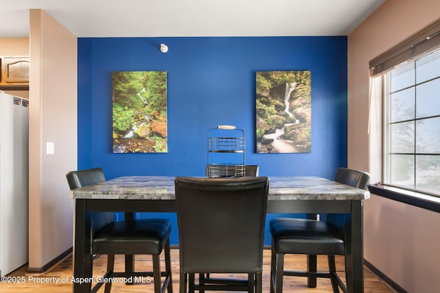 18 Angelica Cir, Parachute, CO 81635 - dining room with wood finished floors and baseboards