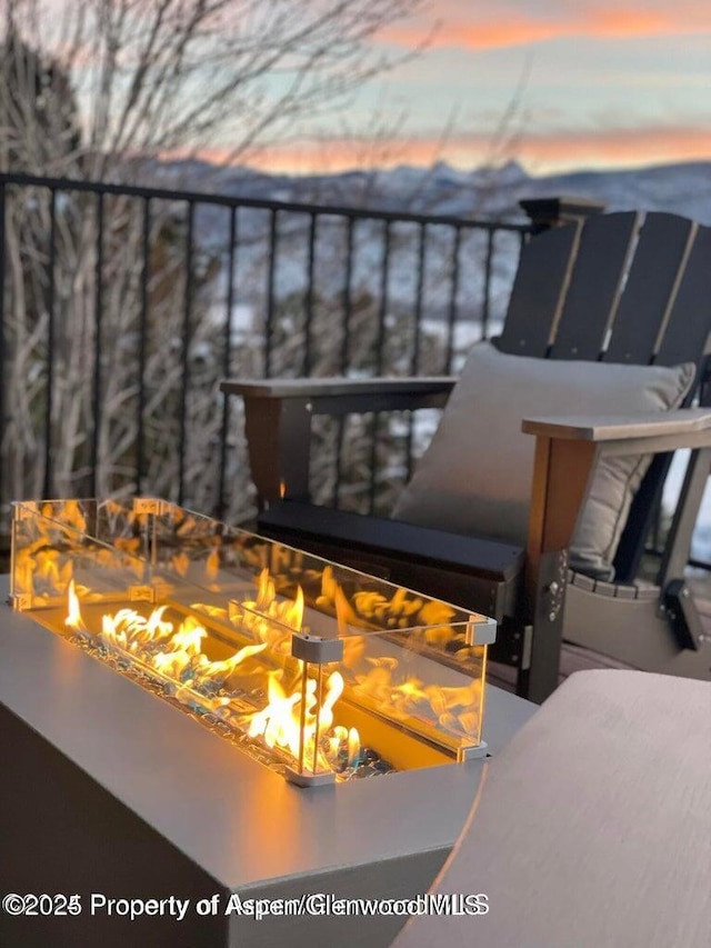587 Hillcrest Dr, Basalt, CO 81621 - detailed view of an outdoor fire pit and a fireplace