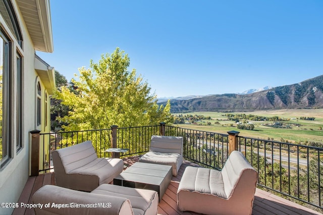 587 Hillcrest Dr, Basalt, CO 81621 - wooden terrace with a mountain view and a view of countryside
