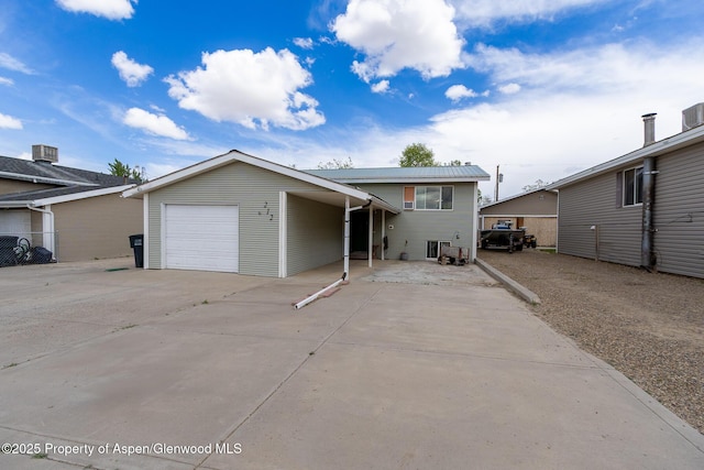 212 River Rd, Rangely, CO 81648 - view of front of property with driveway and a garage