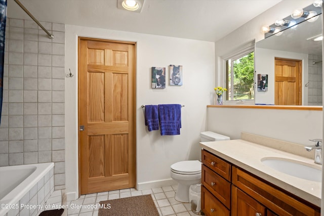 1459 County Road 102, Carbondale, CO 81623 - full bathroom featuring tiled shower / bath, vanity, toilet, and tile patterned flooring