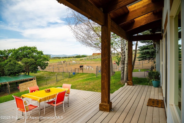 1459 County Road 102, Carbondale, CO 81623 - wooden deck featuring a mountain view, a rural view, and a lawn