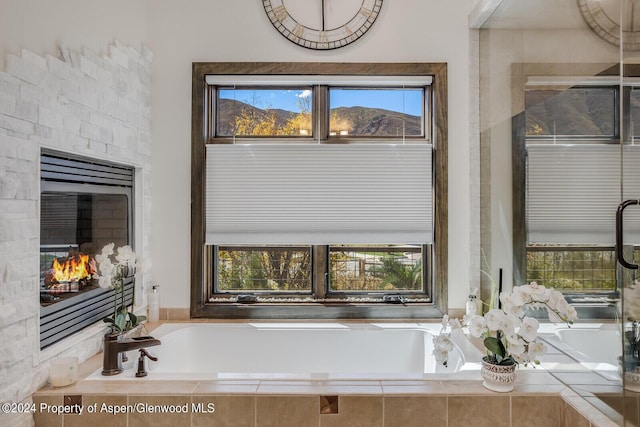 room details featuring a relaxing tiled tub