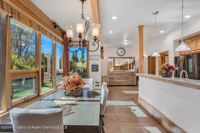 dining area featuring a chandelier