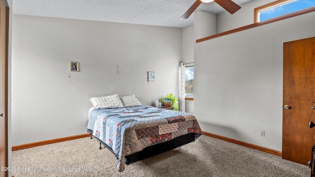 500 Fairway Ave, Rifle, CO 81650 - bedroom featuring carpet floors, baseboards, a ceiling fan, and a textured ceiling