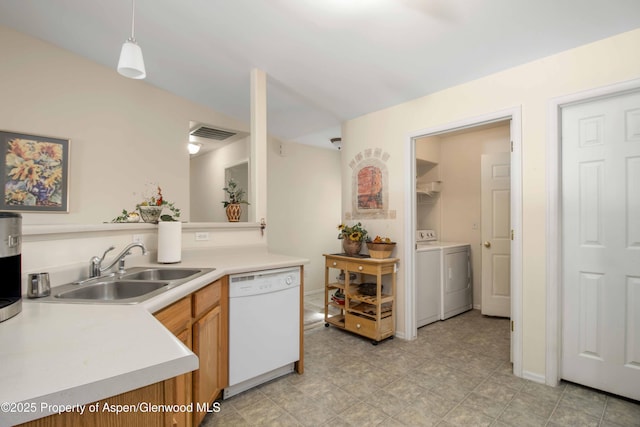 19 Angelica Cir, Parachute, CO 81635 - kitchen with dishwasher, separate washer and dryer, light countertops, and decorative light fixtures