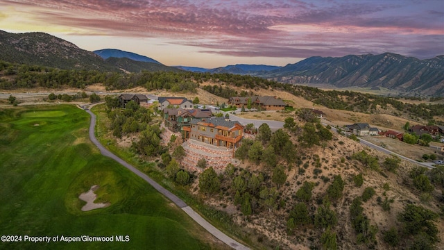 aerial view at dusk with a mountain view