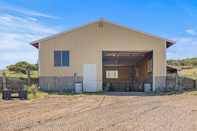5990 County Road 7, Craig, CO 81625 - back of house with an outbuilding, a garage, and a cooling unit
