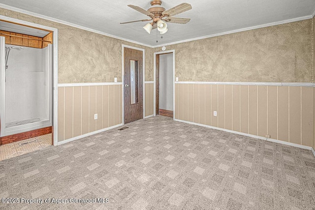 5990 County Road 7, Craig, CO 81625 - unfurnished bedroom with crown molding and a ceiling fan