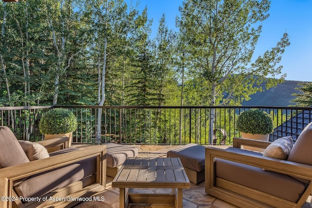 balcony featuring a mountain view