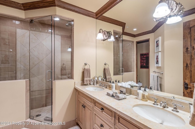 bathroom featuring vanity and an enclosed shower