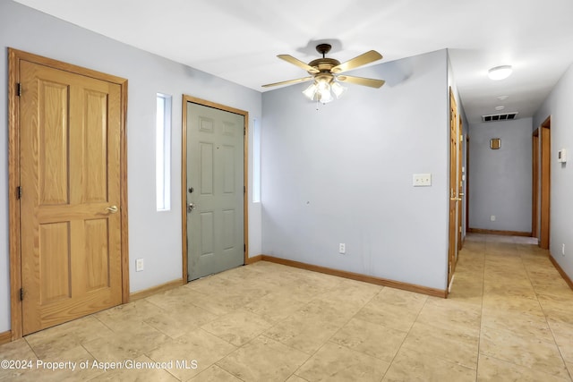 foyer with ceiling fan