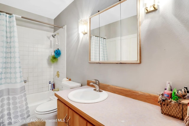 full bathroom featuring vanity, toilet, and shower / tub combo with curtain