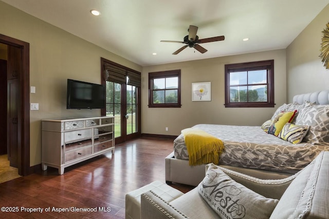289 Sweetgrass Dr, Carbondale, CO 81623 - bedroom featuring access to exterior, multiple windows, dark wood-type flooring, and french doors