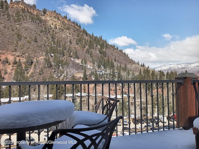 balcony featuring a mountain view