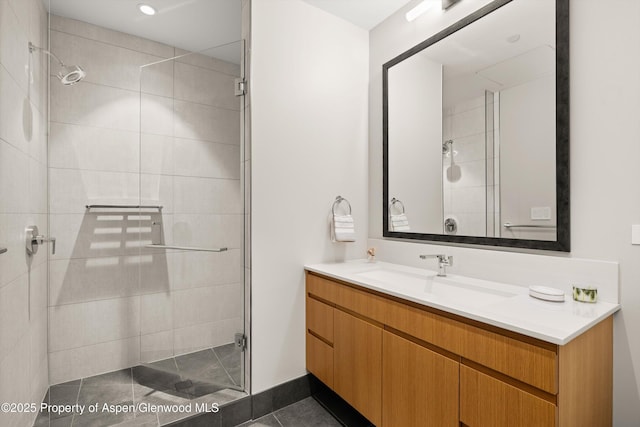 45 Wood Rd Unit 403, Snowmass Village, CO 81615 - bathroom with a stall shower, vanity, tile patterned floors, and recessed lighting