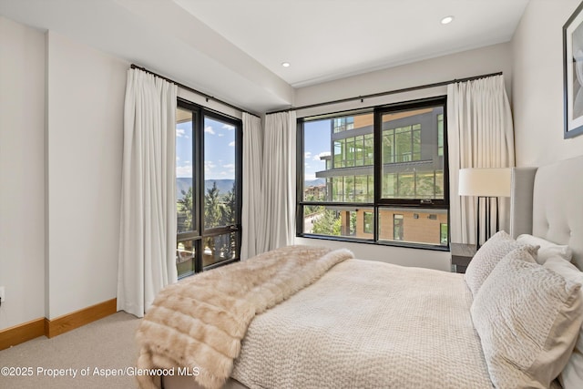 45 Wood Rd Unit 403, Snowmass Village, CO 81615 - carpeted bedroom featuring access to outside and recessed lighting