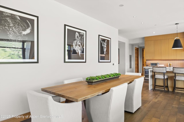 45 Wood Rd Unit 403, Snowmass Village, CO 81615 - dining space featuring dark wood-type flooring and recessed lighting