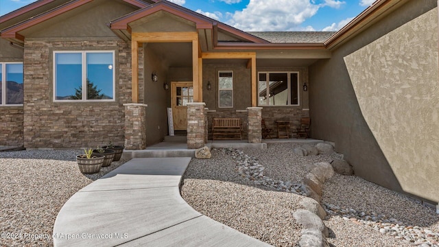 doorway to property with covered porch