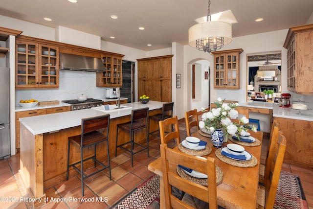 1432 Hooks Spur Rd, Basalt, CO 81621 - dining space featuring light tile patterned floors, recessed lighting, and arched walkways
