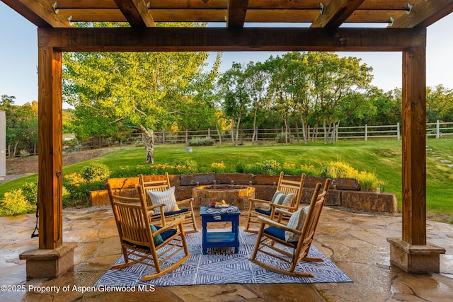 1432 Hooks Spur Rd, Basalt, CO 81621 - fenced backyard with an outdoor fire pit, a patio area, a pergola, and view of wooded area