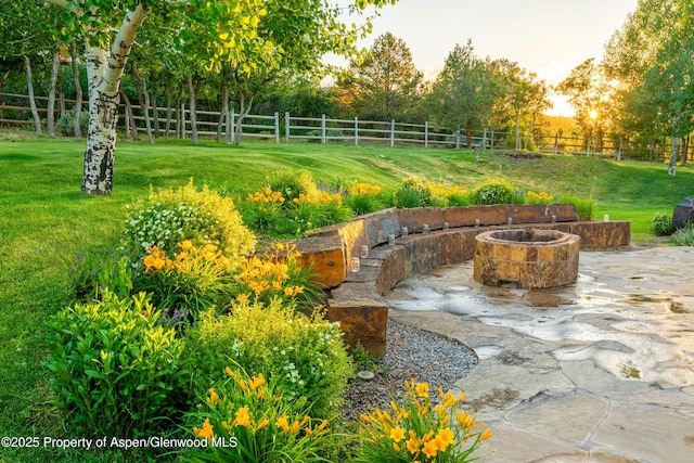 1432 Hooks Spur Rd, Basalt, CO 81621 - fenced backyard with an outdoor fire pit and a patio area