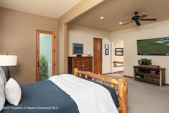 1432 Hooks Spur Rd, Basalt, CO 81621 - bedroom featuring light colored carpet, recessed lighting, arched walkways, and connected bathroom