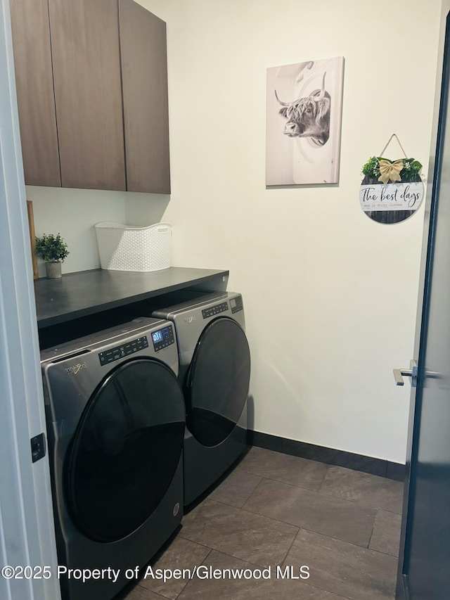 88 Green Mesa Pl, Parachute, CO 81635 - washroom with washer and dryer, cabinet space, and baseboards