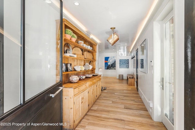 63 Smuggler Grove Rd, Aspen, CO 81611 - hallway featuring light wood-style floors
