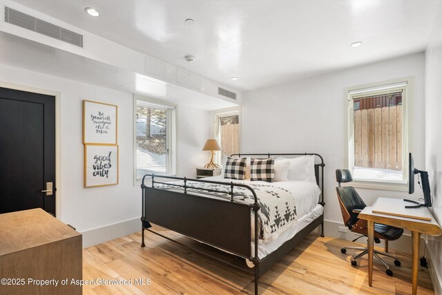 63 Smuggler Grove Rd, Aspen, CO 81611 - bedroom featuring light wood finished floors, recessed lighting, and an office area