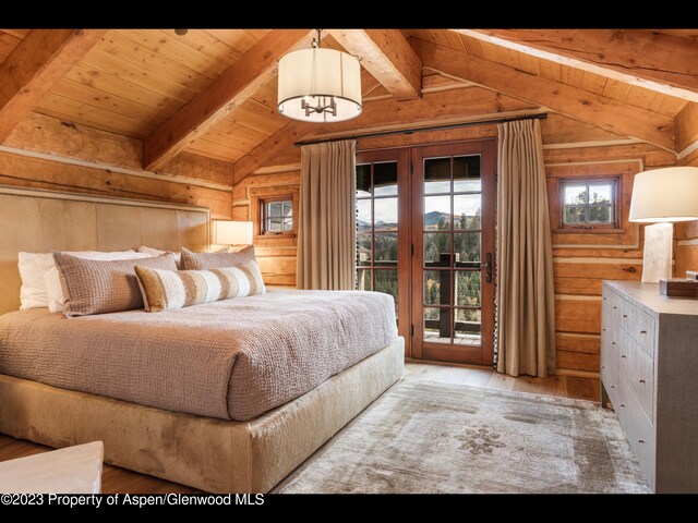 bedroom with wooden ceiling, wooden walls, vaulted ceiling with beams, access to exterior, and light hardwood / wood-style floors