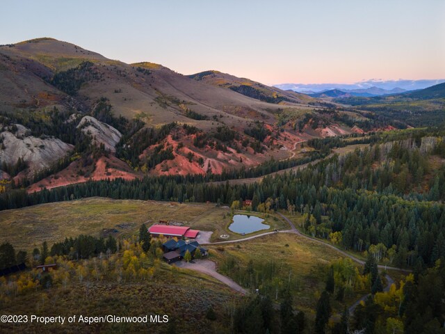 aerial view at dusk with a mountain view