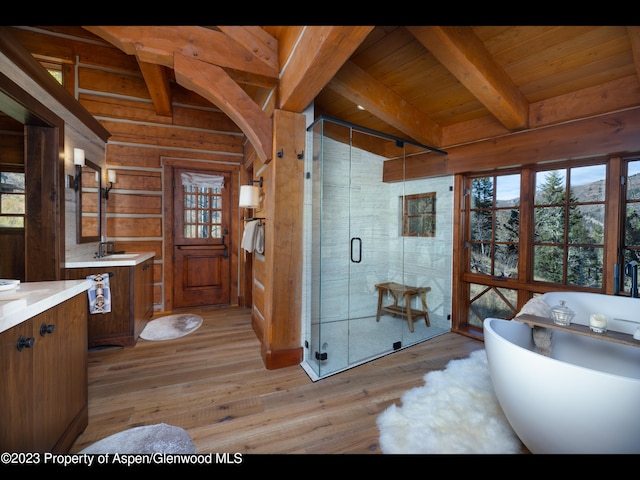 bathroom featuring hardwood / wood-style floors, separate shower and tub, wood ceiling, and wood walls