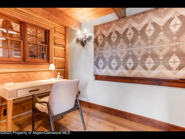 home office featuring hardwood / wood-style floors