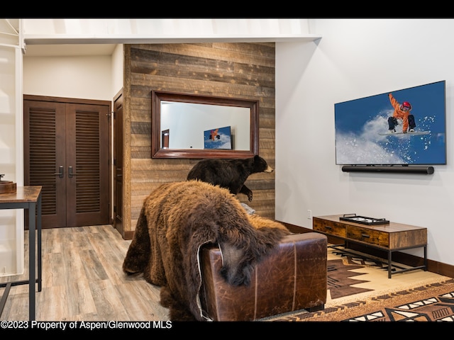 living room featuring hardwood / wood-style floors and french doors