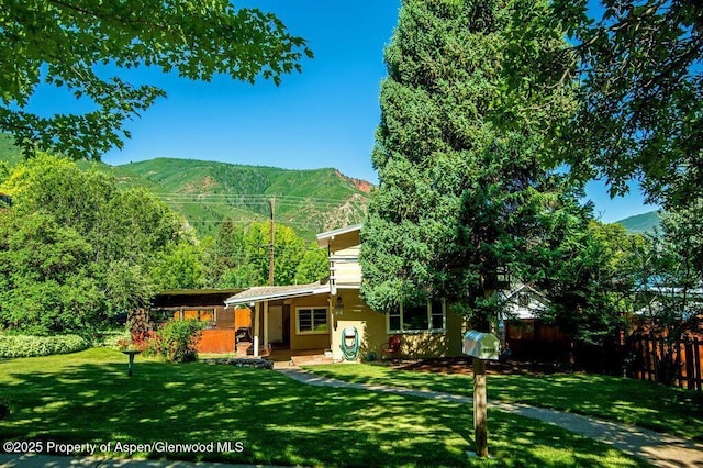 1105 Bennett Ave, Glenwood Springs, CO 81601 - rear view of property featuring a mountain view and covered porch