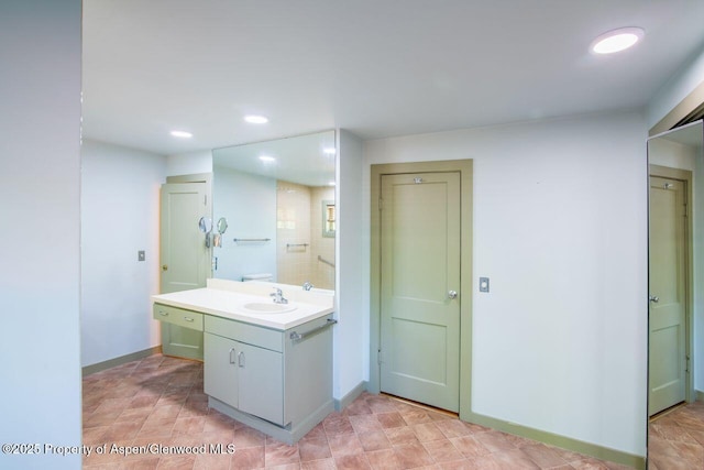 1105 Bennett Ave, Glenwood Springs, CO 81601 - bathroom featuring vanity and recessed lighting