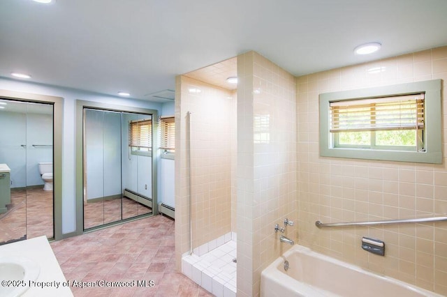 1105 Bennett Ave, Glenwood Springs, CO 81601 - bathroom with a garden tub, vanity, a shower stall, a baseboard heating unit, and recessed lighting